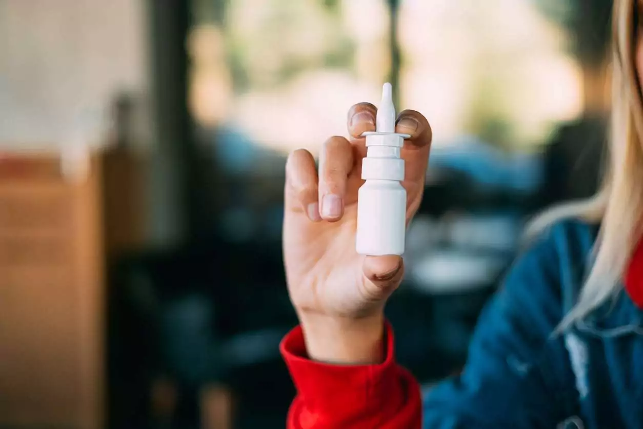Nurse holding bottle of Spravato Nurse holding bottle of Spravato