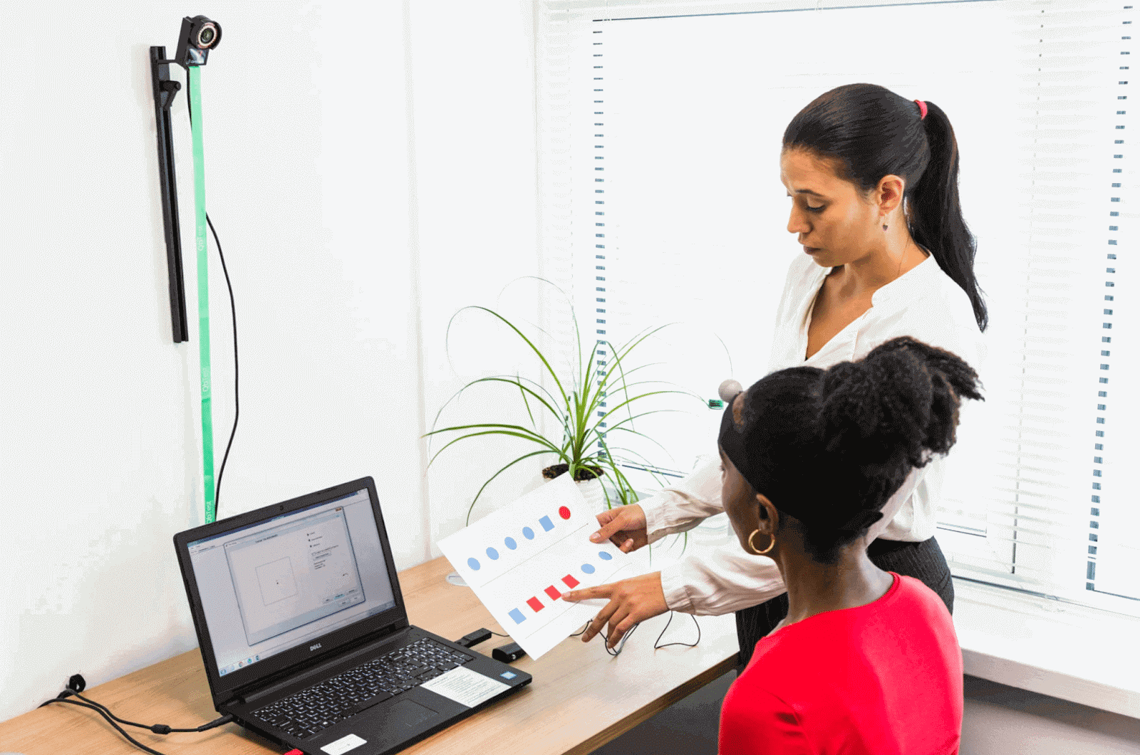 BestMind-telemedicine-3 BestMind technician going over results with client.